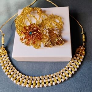 Elegant Gold and Pearl Necklace Set